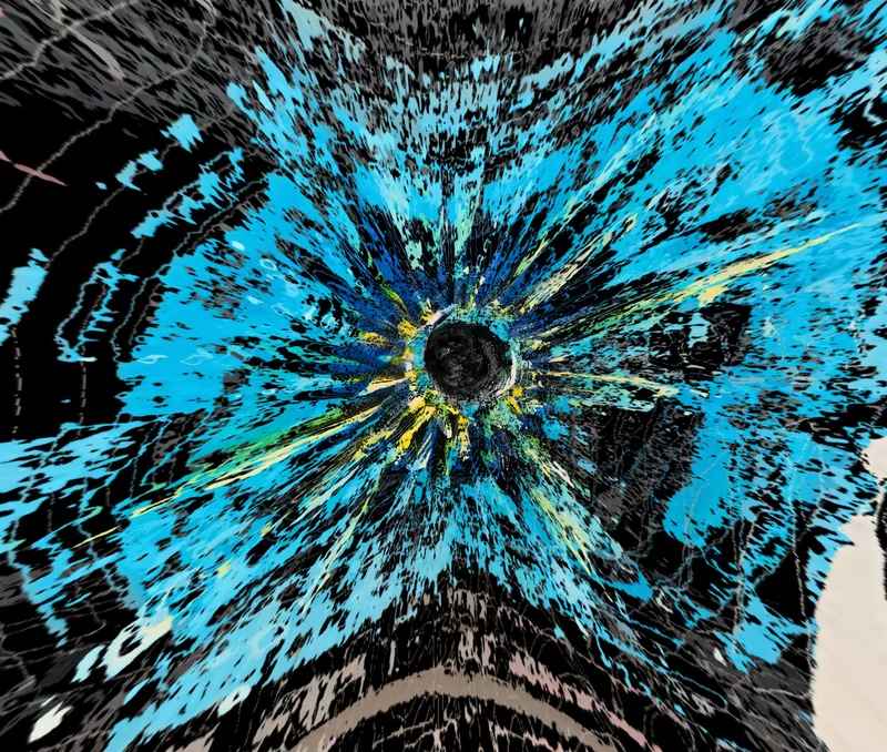 Bright blue splashes bursting out from a dark centre against black
